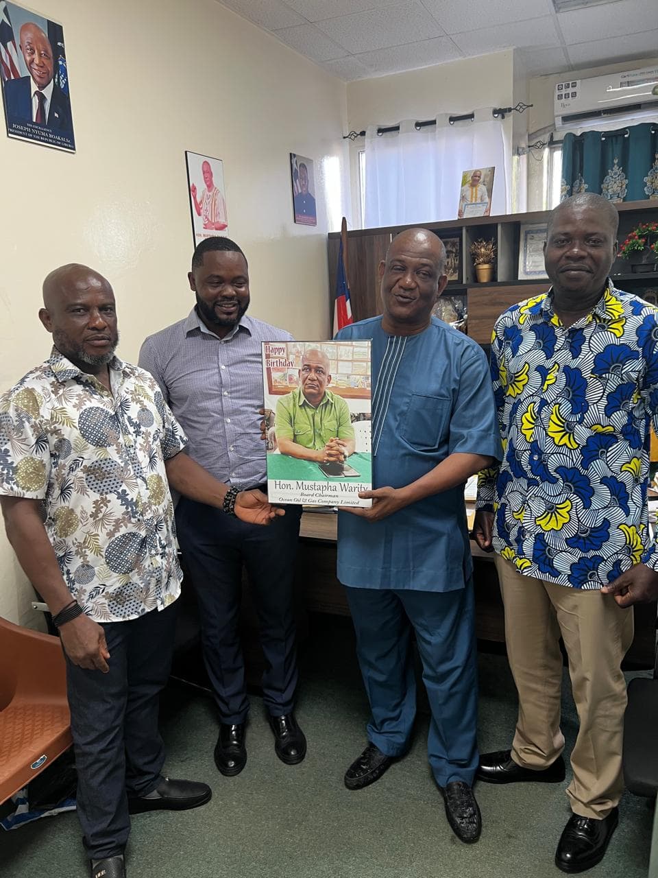 Celebrating Board Chairman Hon. Mustapha Waritay's birthday with the leadership team.