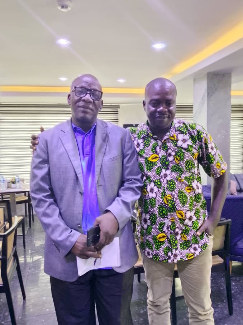 Ocean Oil CEO and consultant holding a business meeting in Lagos, August 2026.